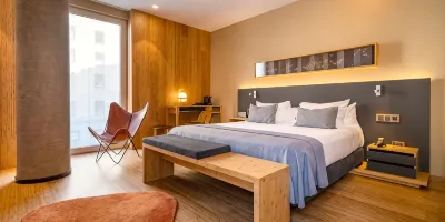 Habitación doble/twin de lujo con cama supletoria — Fotografía del anuncio en Trip.com